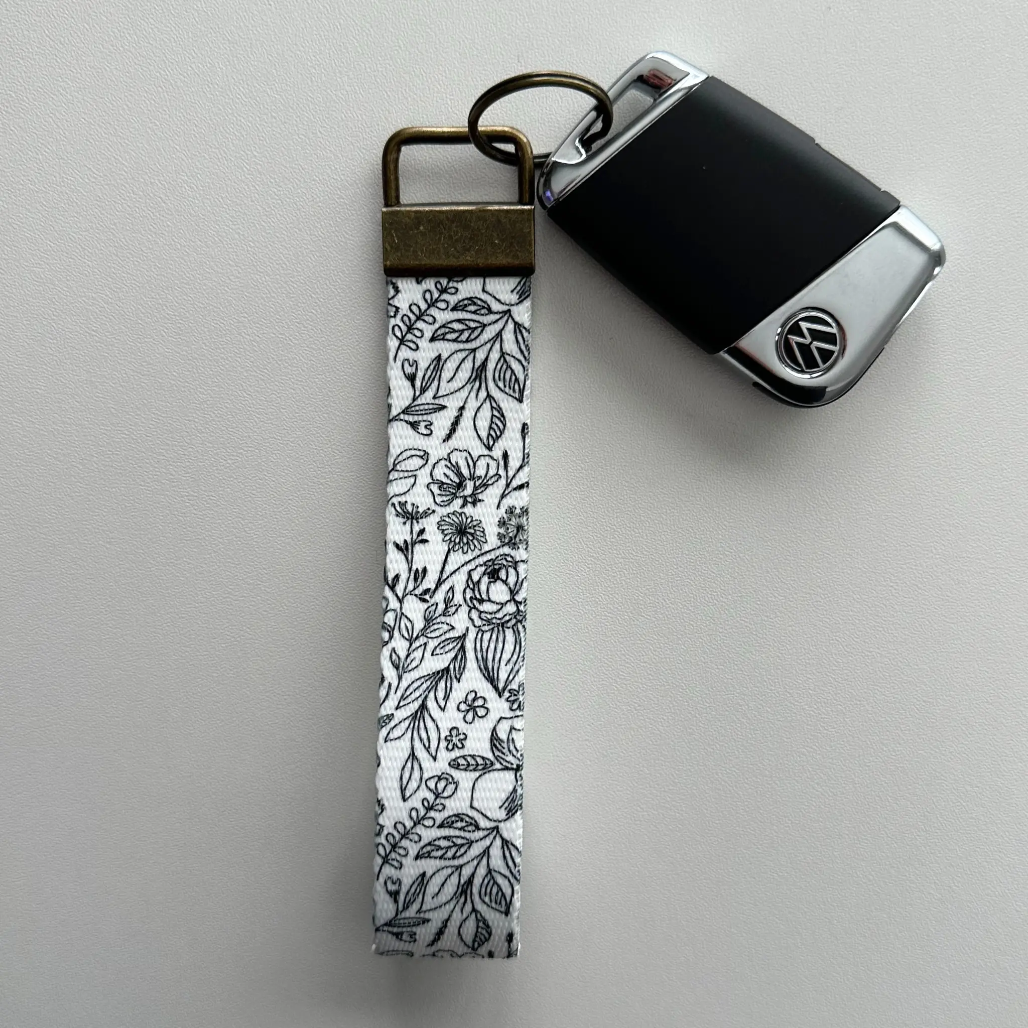 Black & White Floral Key Fob Wristlet | Antique Brass Hardware
