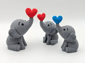 Knitted Elephant Blowing a Heart Bubble