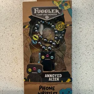 Fuggler Annoyed Alien Phone Wristlet