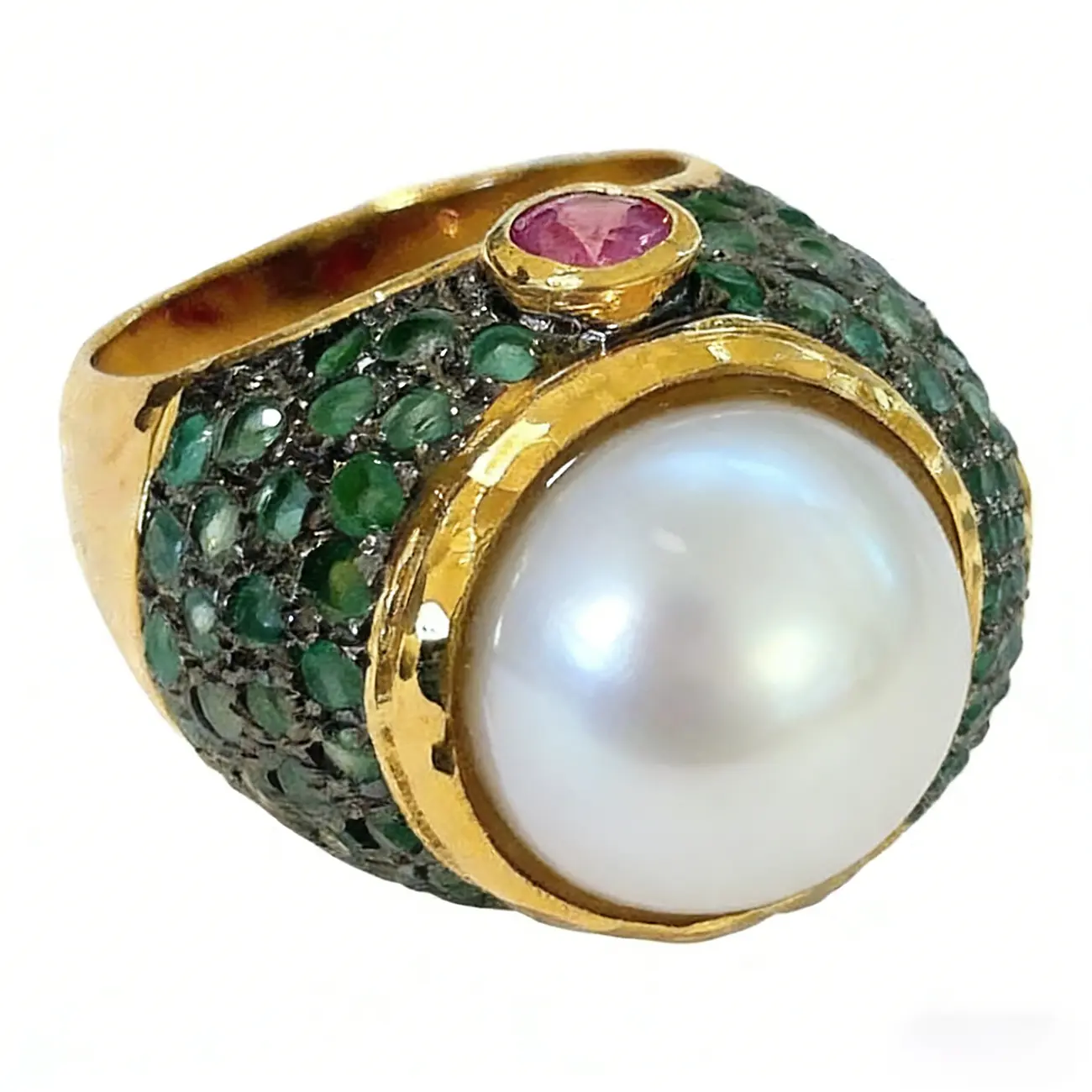 A high-end luxury ring blending vintage elegance with modern opulence, featuring a 14K gold-plated center stone of cultured pearl surrounded by tiny synthetic emeralds, symbolizing nobility and elegance—luxury jewelry for women