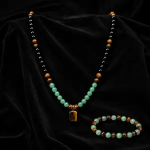 Unisex wealth bracelet and necklace jewelry set featuring green Dongling tiger stone and obsidian beads; feng shui lucky wealth bracelet; wealth accumulation and fortune-enhancing design; wearable accessory; protective auspicious jewelry gift. Beaded Jewe