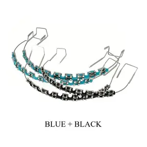 Temporary tooth decoration using metal wires, metal brackets, and orthodontic ligaments for orthodontists and dental students