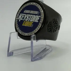 The KEYSTONE  deCAPitator ring bottle cap & can tab opener, busts open your favorite beverage with a flick of the wrist.