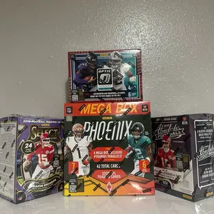 (763) 4 box  PICK YOUR TEAM football sports cards breaks!!!!!!! 4 - 2025 boxes including (1x) Phoenix MEGA box (1x) Optic blaster box. (1x) Select blaster box.  (1x) Absolute blaster BOX!!