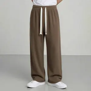 Men’s American vintage corduroy straight-leg pants—trendy, versatile brown casual long trousers with a drawstring waist and loose fit; simple, stylish men’s bottoms suitable for everyday wear and sports.