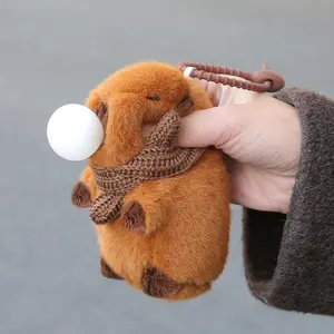 Capibara plush hanging toy. A popular internet-famous schoolbag pendant, doll, stuffed toy, car keychain, and gift.
