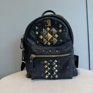 Pre-owned MCM Studded Backpack Visetos Coated Canvas with Leather Trim Black Medium Backpack