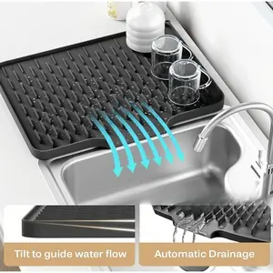 Non-slip silicone kitchen drain mat with drainage. Heat-resistant, easy to clean. For countertops, sinks, refrigerators. Keeps kitchen dry