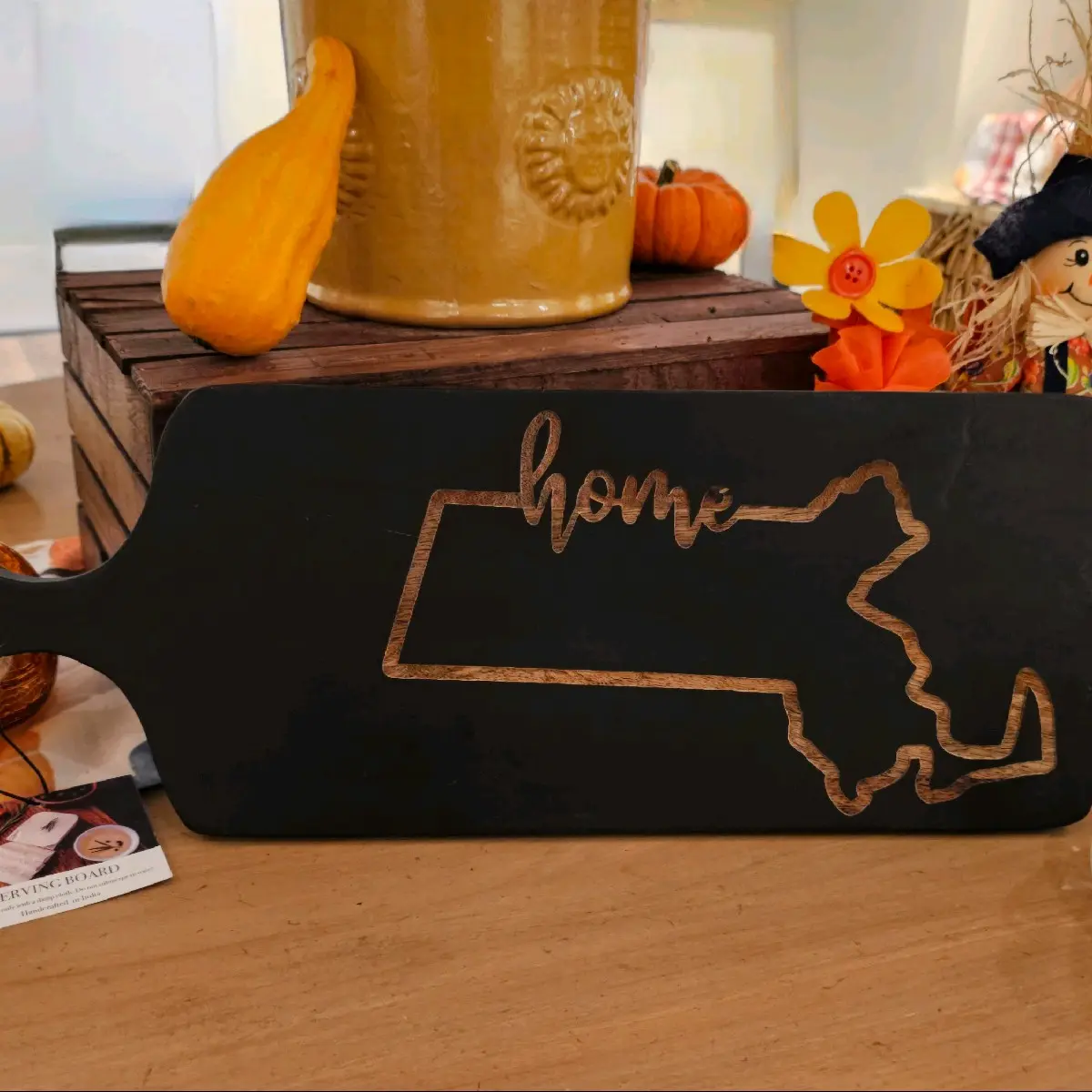 Custom engraved wooden serving board.