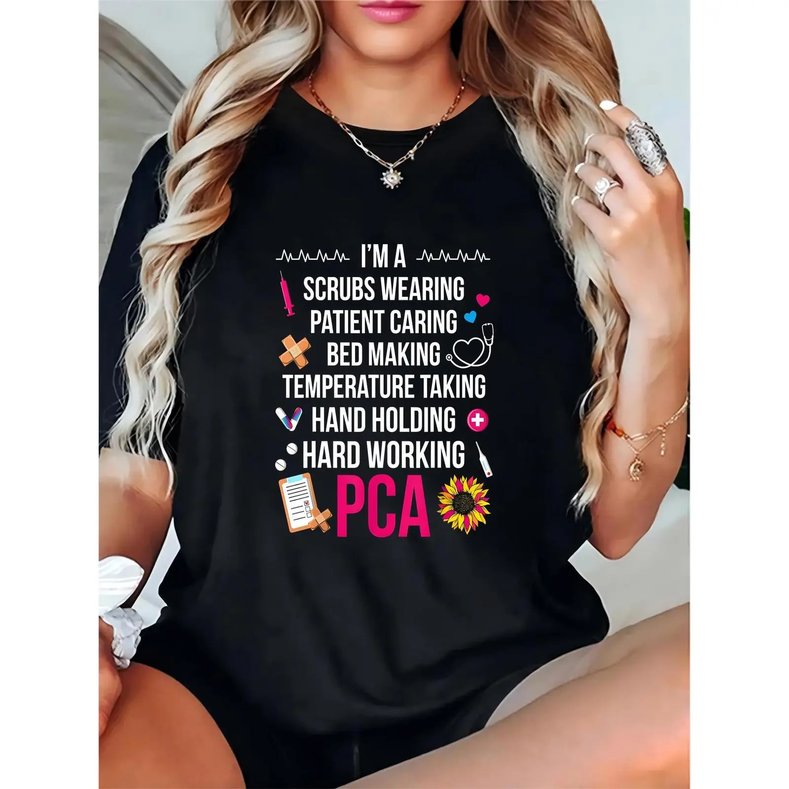 Ladies' Short Sleeve Black Tee - "I’m a Scrubs Wearing PCA" Print with Medical Icons (Syringe, Stethoscope, Sunflower), Nursing Tasks, Feminine Fit, Comfortable Basic Women's Top for Healthcare Workers, Nurse Appreciation