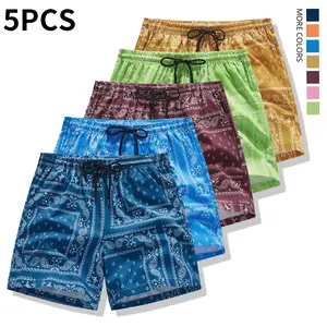 A must-have for beach vacations—pack 5! Men’s nut pattern ice silk shorts, new for summer—quick-drying, breathable mid-length shorts with an elastic waistband and drawstring design; comfortable wear that doesn’t squeeze the waist, suitable for different b
