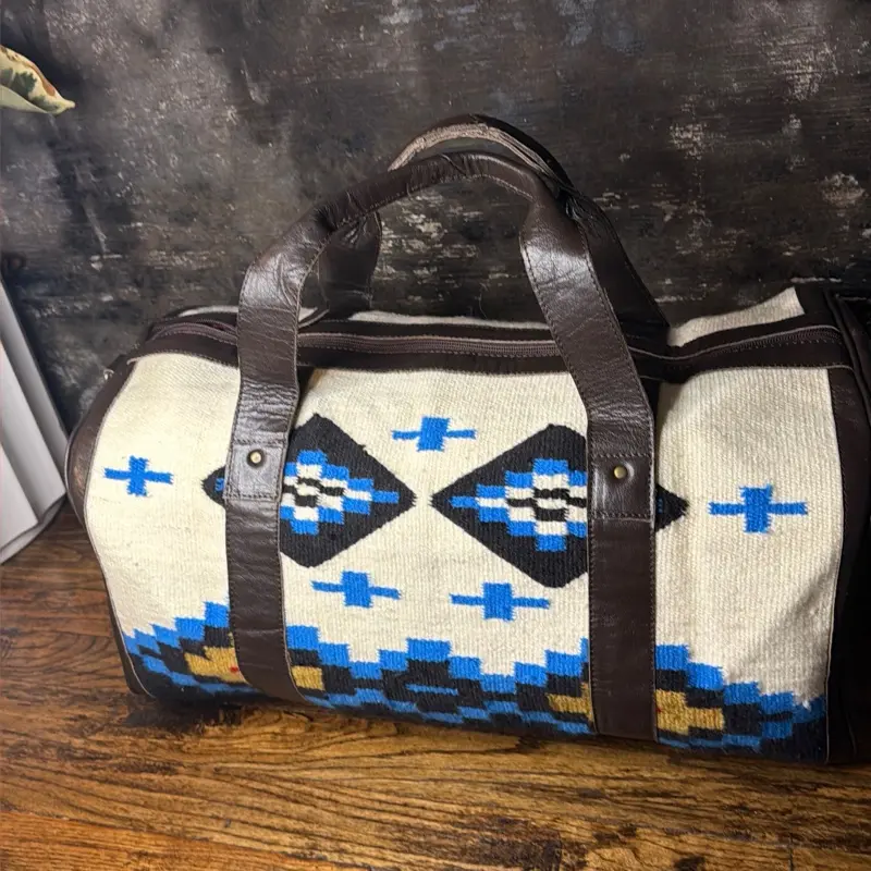 Leather suitcase with Aztec design