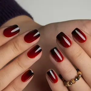 Velvet Wine Ombre – A luxurious and sophisticated nail design blending deep wine red into a seamless ombre, offering a glossy, rich finish that exudes elegance and mystery, perfect for adding a touch of timeless glamour to your style.