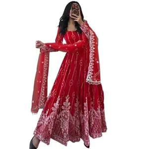 Reddish pink Anarkali suit with a graceful flare and elegant detailing. Perfect for weddings and festive occasions. Soft, flowy, and beautifully flattering.