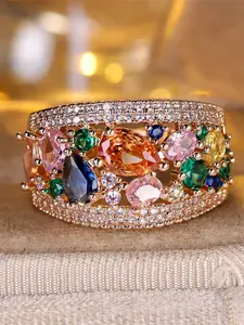 Women's gold, rainbow-colored zirconia gemstone wedding promise, love commitment, wedding ring.