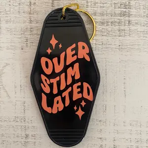 OVERSTIMULATED CAMPER KEYCHAIN