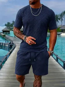 Comfortable Summer Essential Men's Set Textured Knit Fabric Short Sleeve Crew Neck Top and Loose Fit Shorts Great for Indoor Relaxation and Casual Daily Looks