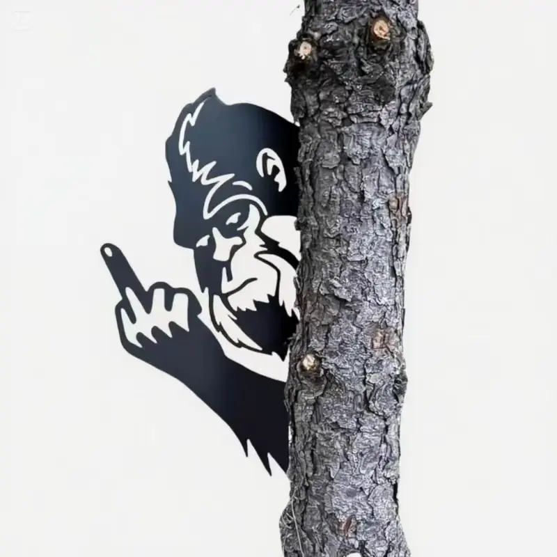 Bigfoot Metal Sign Decorative Art Bigfoot peeks out from behind a tree at the sign's corner Perfect for garden fences and farmhouse outdoor home decor