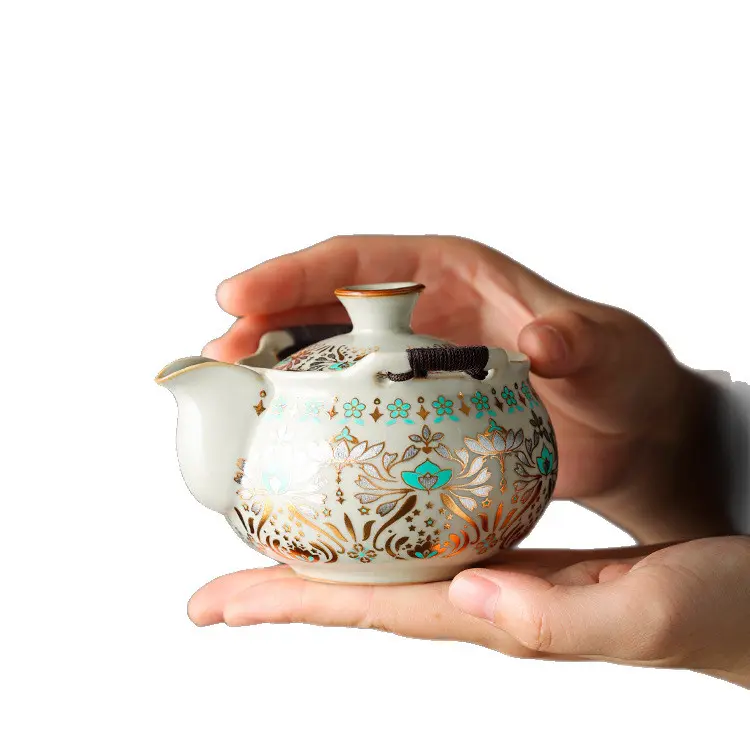 Ruyao portable ceramic tea set featuring Dunhuang motifs, stackable for easy layering, Quick Guest outdoor travel teacup and tea infuser