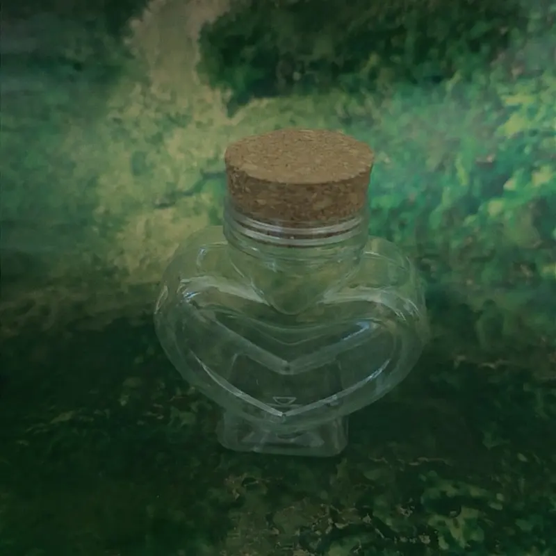 Small plastic heart bottle