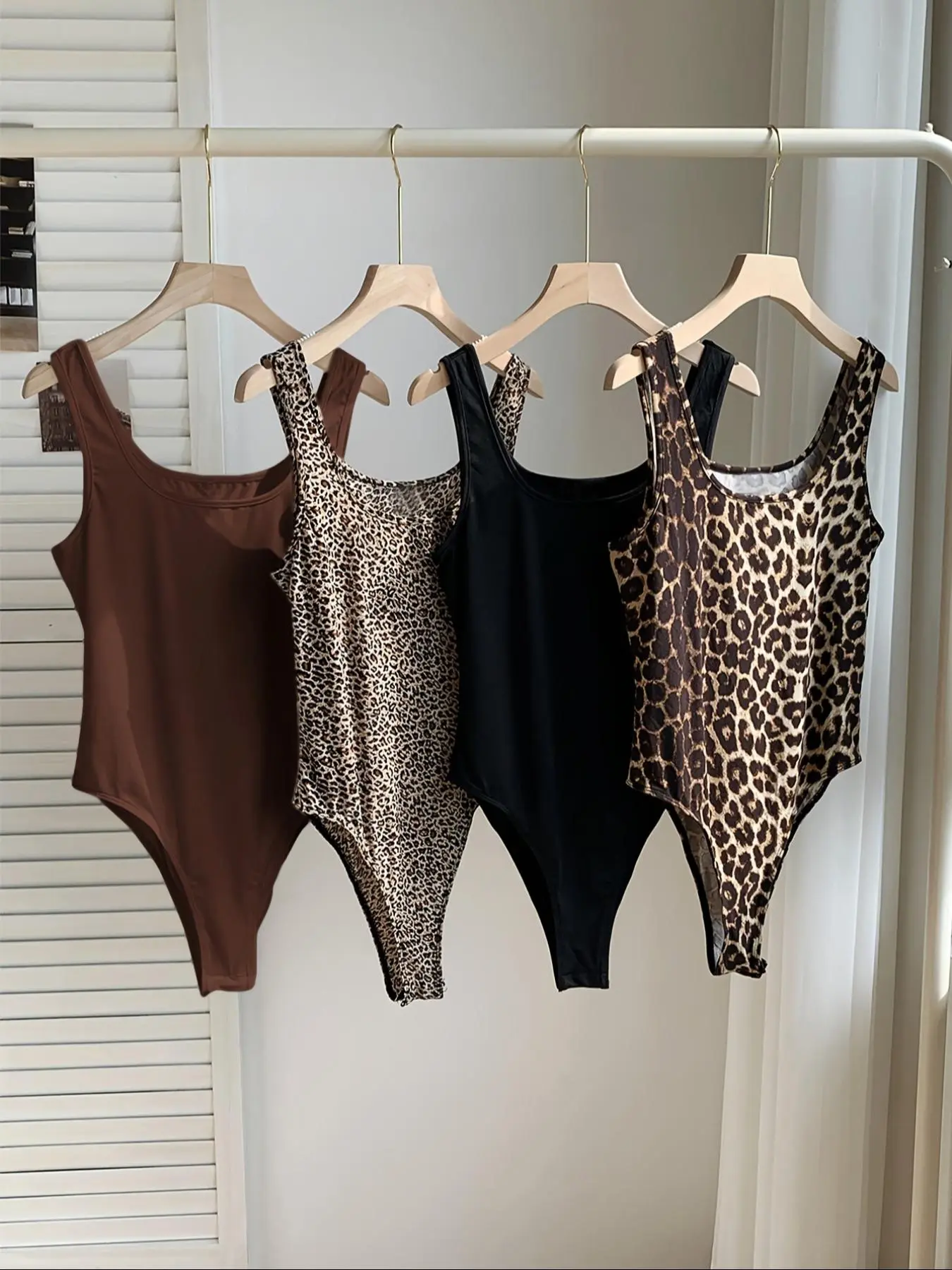 Elegant Leopard Print Bodysuit Set, Sexy Slim-Fitting Sleeveless Tank Top, Four-Piece Matching Outfit, Trendy European and American Style, Womenswear