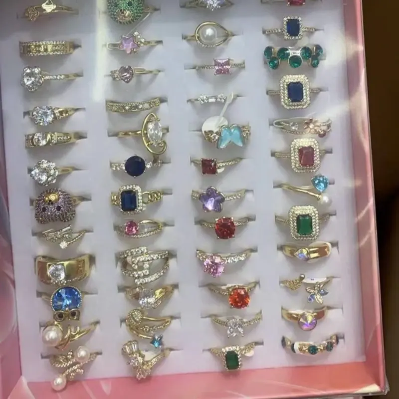 Wholesale box with 48 rings, comes in different mixed sizes. High quality and water resistant jewelry.