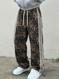 Leopard Print Track Pants | Side Stripe Detail | Drawstring Hem | Oversized Wide-Leg Fit | Premium Comfort | Streetwear Essential for Trendsetting Men & Women