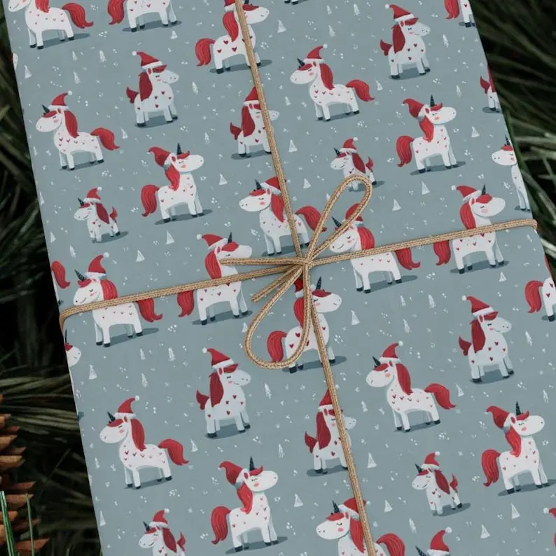 Unicorn Sleigh Ride Wrapping Paper Roll | Cute Christmas Gift Wrap with Santa Hats and Winter Hearts Pattern | Premium 90 GSM Paper