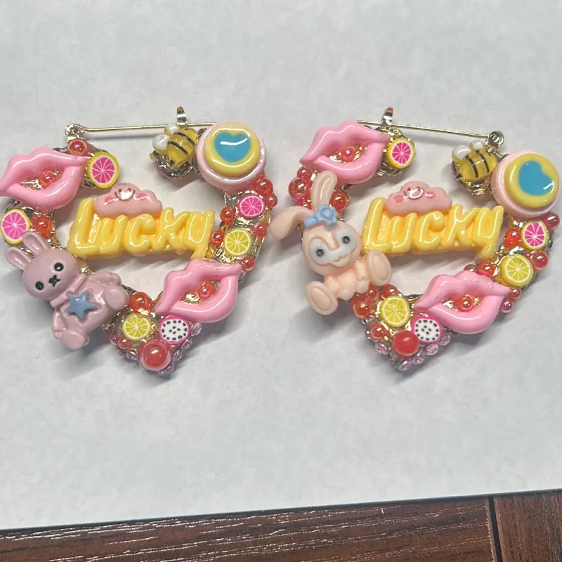 Custom Handmade Lucky Junk Charm Earrings with Signature Bedazzled Back Featuring Rabbits and Lips Design