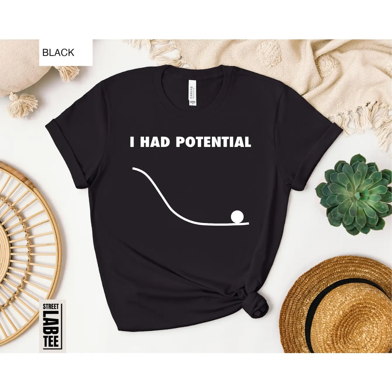 Men's science humor physics pun Graphic T-Shirt - Short Sleeve Crew Neck Regular Fit Casual Wear |   Soft & Breathable Fabric, Durable Print, Everyday Comfort, Machine Washable, minimalist flat lay lifestyle table display