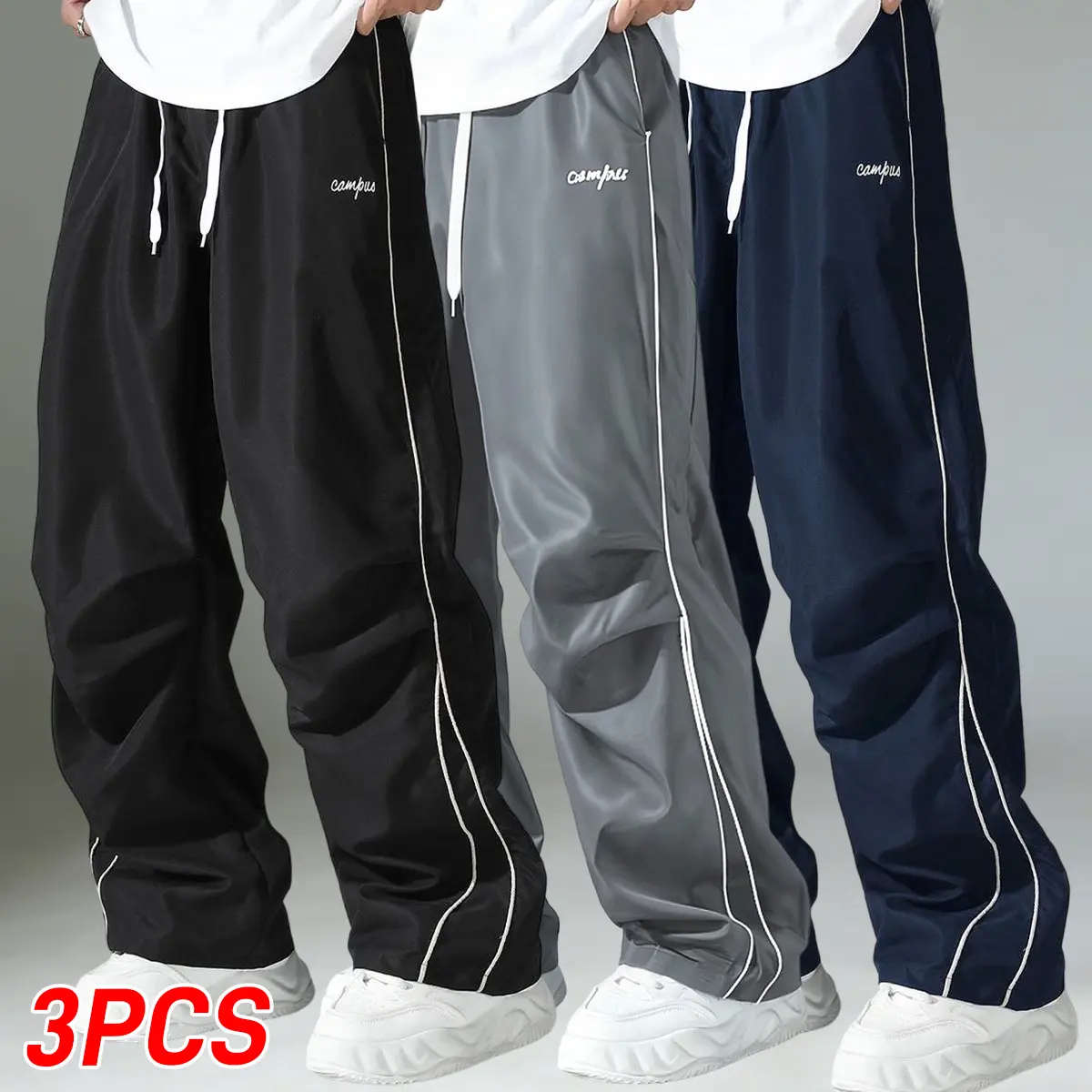 Men’s jogging pants, 3-pack, with side stripe detailing, straight loose fit, comfortable, breathable, and lightweight—ideal for everyday casual sports.Men's long pants, men's bottoms