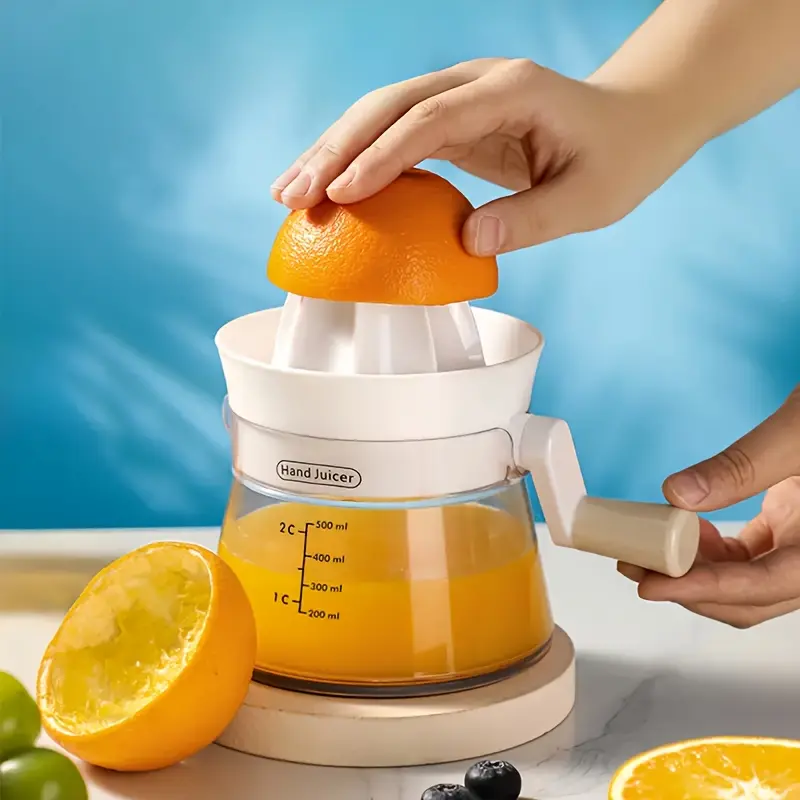 A multi-function manual juicer with an integrated measuring cup, suitable for lemons, limes, oranges, and a handy kitchen tool for home, office, and camping.