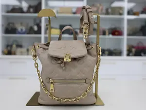 Pre-owned Louis Vuitton LEATHER Backpacks COUSSIN PM BACKPACK