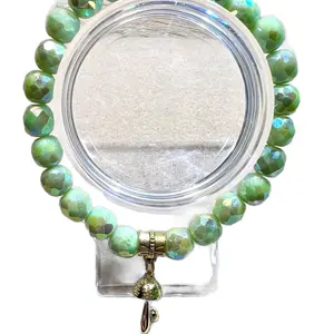 Repurposed vintage green glass necklace to stretch bracelet with gold plated mushroom charm  size 7.5 but stretchable                       Female Anniversary Birthday Daily