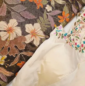 Floral Theme Black Color Tissue Georgette Saree with handwork border