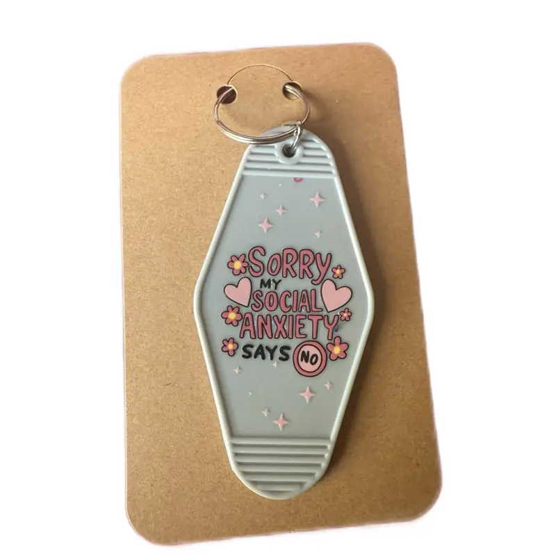 Motel Keychain - "Sorry My Social Anxiety Says No" Design with Heart Motif and Keyring Attachment in Grey and Pink Plastic