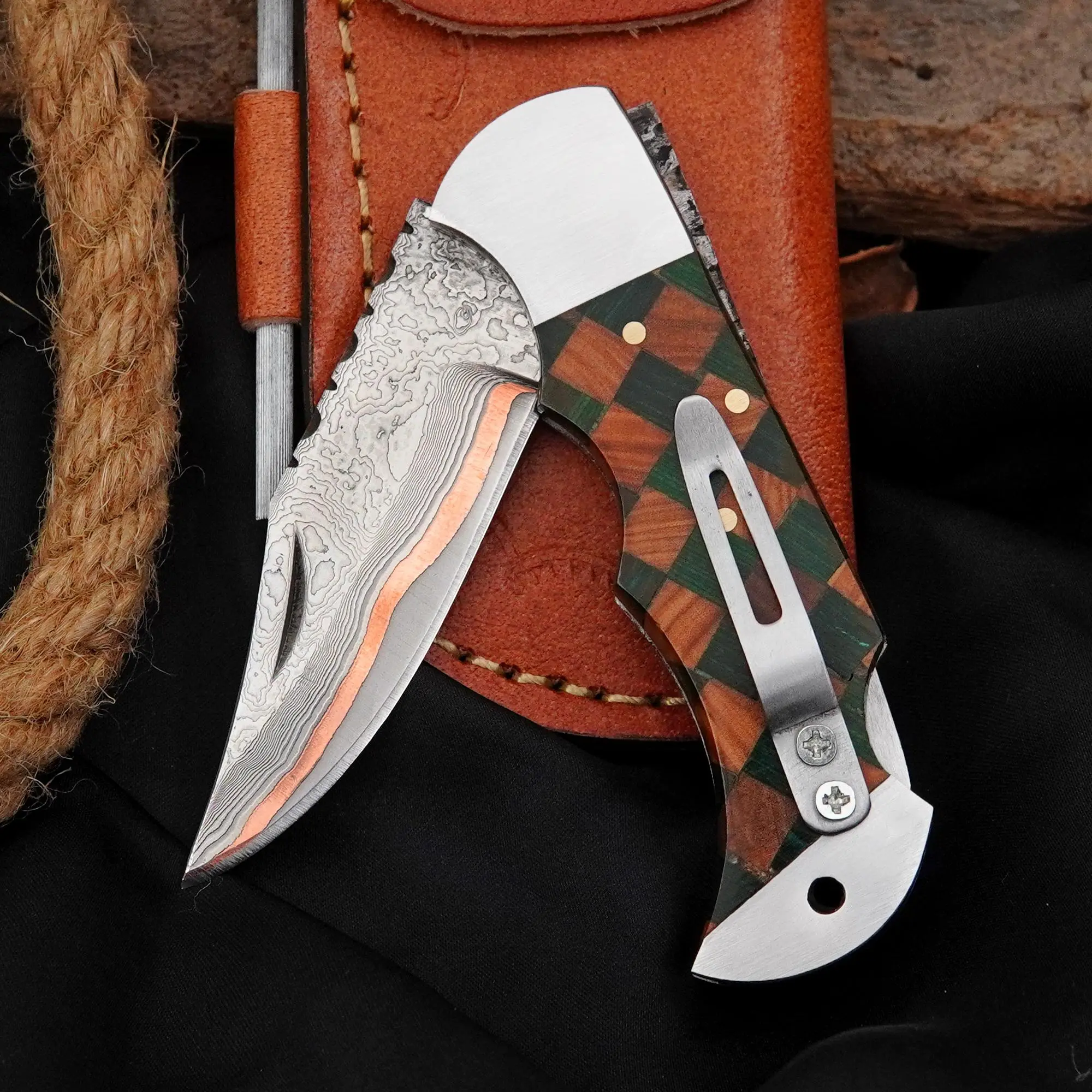 Handmade folding knife with Copper & Damascus