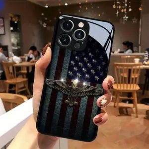 American flag and eagle design in gold, suitable for iPhone 17 16 15 14 13 12 11 PRO MAX PLUS,AIR. This dedicated phone case is stain-resistant, stylish, and made of tempered glass. An ideal gift for holidays, friends, and family.