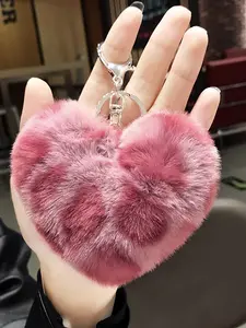 Leopard-Print Plush Heart-Shaped Pom-Pom Keychain Pendant: A soft and cute pom-pom accessory for bags and keys. This stylish and versatile keychain is perfect for bags, keys, or car decorations—available in heart and round shapes.