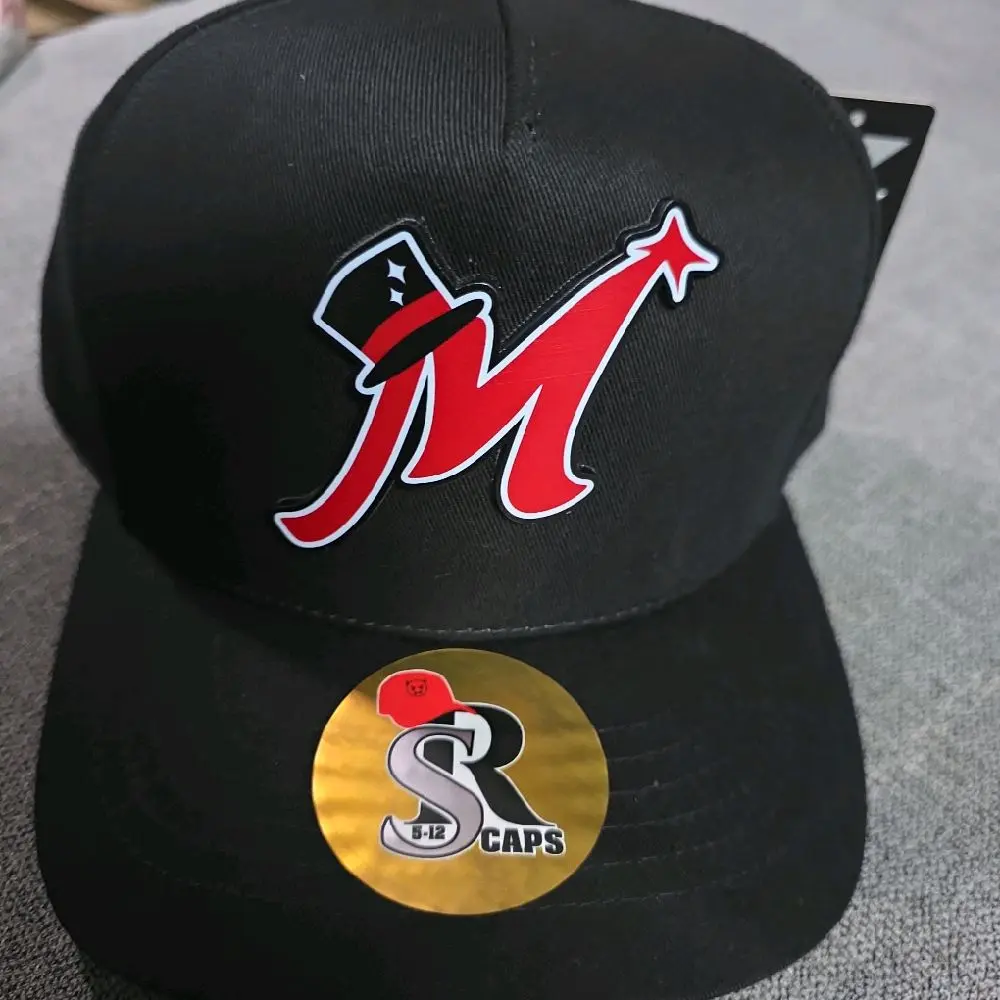 Gorra  M mago color obscuro marca kamel  ajustable