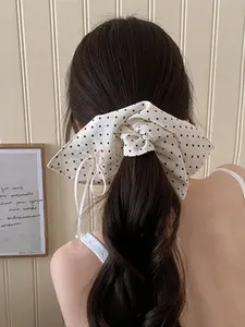 The square bow headband designed with polka dots is a cute accessory for women and girls, perfect for daily wear or special occasions