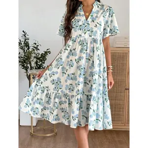 A women's V-neck short-sleeve midi dress with a layered skirt, featuring white fabric with blue hydrangea prints, Womenswear, exuding an everyday style, suitable for city shopping, afternoon tea with friends, or light commuting occasions