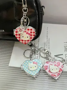 Cute leopard print checkered KT cat heart mirror keychain, suitable for daily wear, vacation dates, and other occasions, and also a delightful little gift.