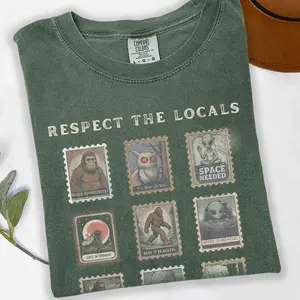 Comfort Colors Respect the Locals Cryptid Tee – Vintage Stamp Mothman Shirt – Sasquatch Bigfoot National Park Gift – Retro Alien Folk Horror Shirt – Cryptid Core Apparel