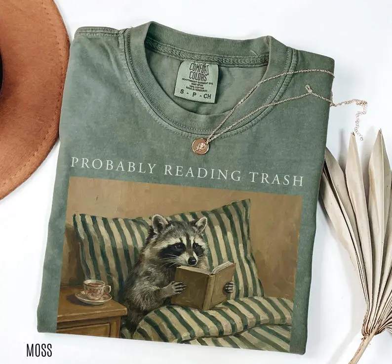 Comfort Colors Probably Reading Trash Raccoon  Shirt, Funny Book Lover Graphic Tee, Retro Reading Raccoon T-Shirt, Book Club Gift, Cozy Reader Apparel, Literary Humor Shirt