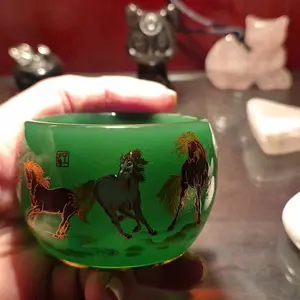 Handmade tea cup with jade green glaze and gold painted Eight Horses, master cup