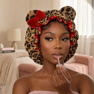 Cute leopard-print plush sleep cap with bear ears and a bow; women’s sleep cap with ruffle detailing and satin lining; anti-frizz hair protection night cap; soft, stretchy headwear suitable for curly-haired users during sleep, everyday beauty routines, an