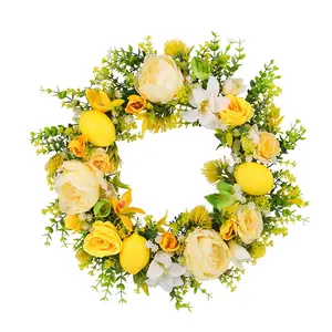 Small fresh plants woven with lemon yellow flower garlands for indoor and outdoor decoration. Front door hanging, living room, wedding props, and artificial spring flower garlands are used as materials mesh wreath Vibrant Cedar