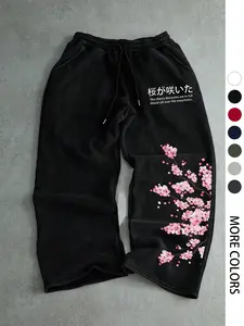 Japanese Cherry Blossom & Kanji Print Black Baggy Sweatpants, Elastic Waist Streetwear Joggers for Men, Sakura Floral Graphic Casual Pants.