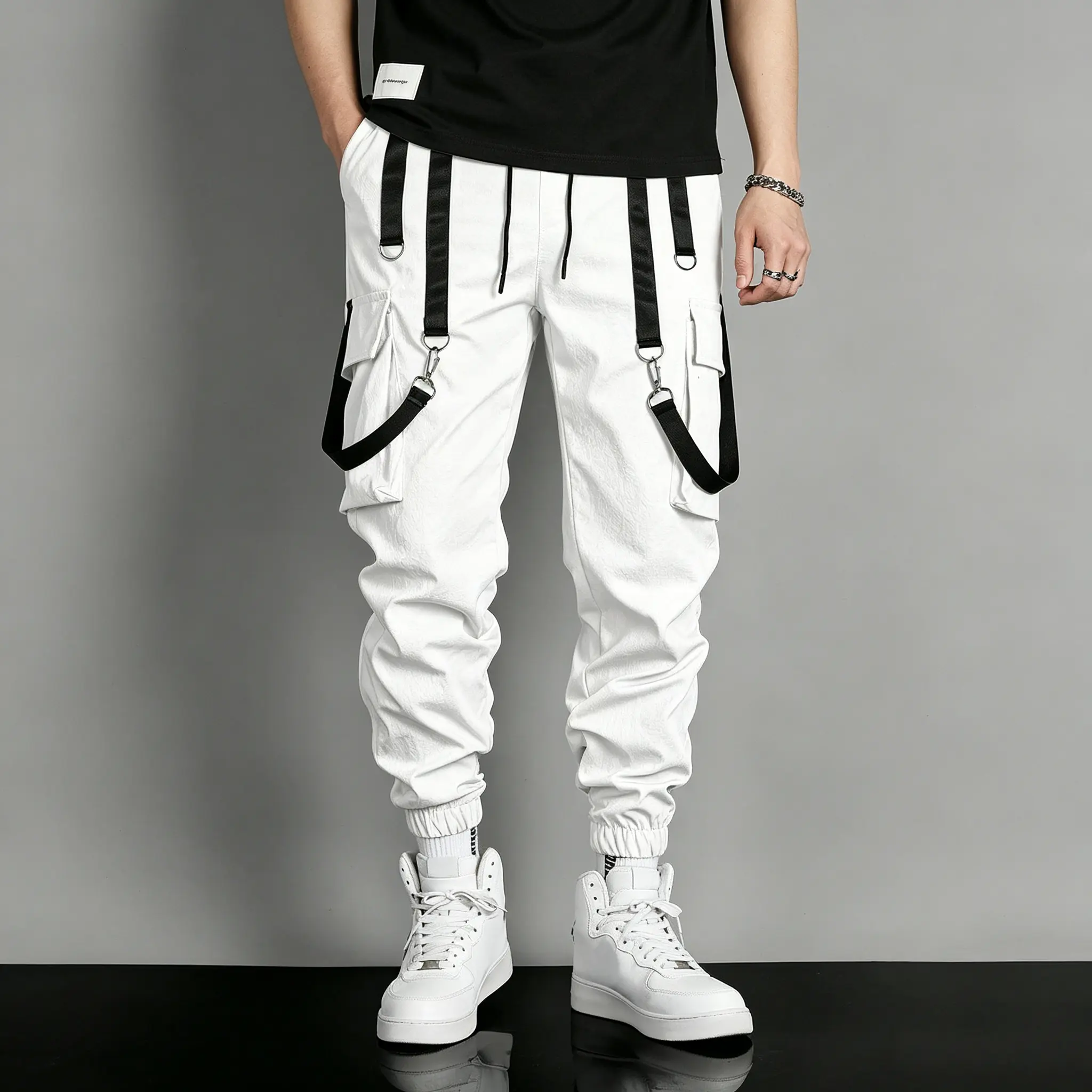One piece with a smooth drape and structured feel; high-waisted cargo casual pants with ankle cuffs; lightweight, trendy, relaxed vibe; pure white fabric that resists softening/sagging; minimalist clean white tone; drawstring at the waist; optimized waist